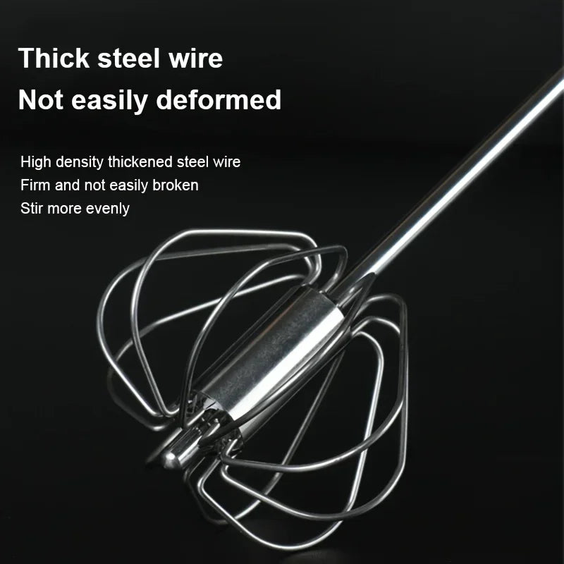 Close-up of a thick, high density steel wire whisk against a black background