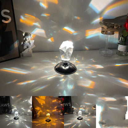 Modern crystal prism light on black base casting colorful reflections on white surface and wall