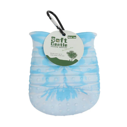 Blue and white silicone pet paw cleaner with soft gentle bristles and hanging tag